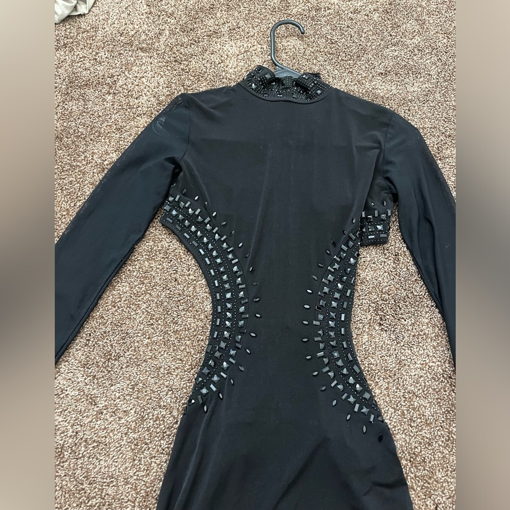 Kikiriki ball length gown with side cut outs. New with tags.